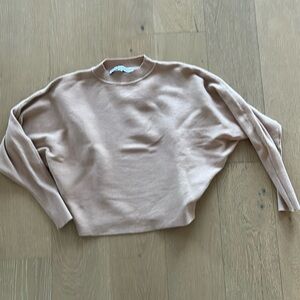 Sweater with bat wing arms